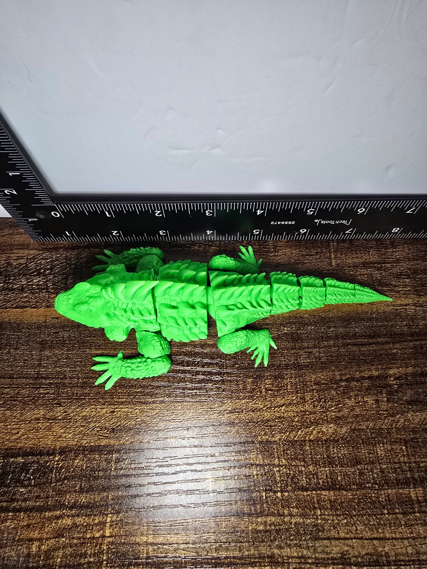 articulated iguana fidget toy
