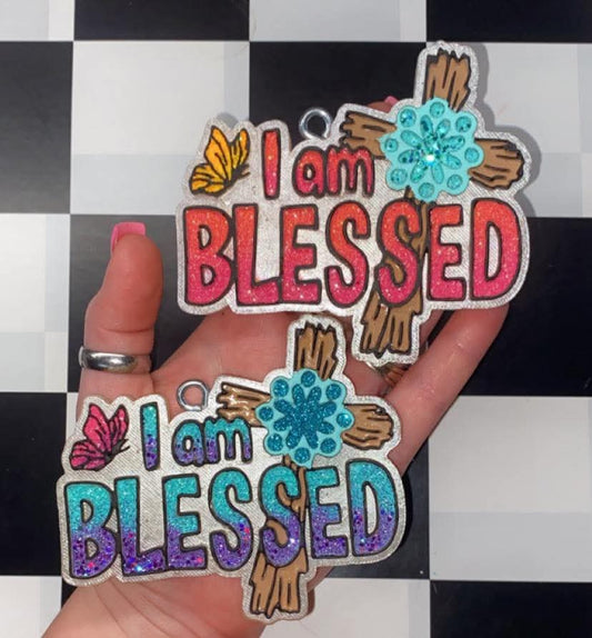 I am blessed with cross and butterfly silicone freshie mold