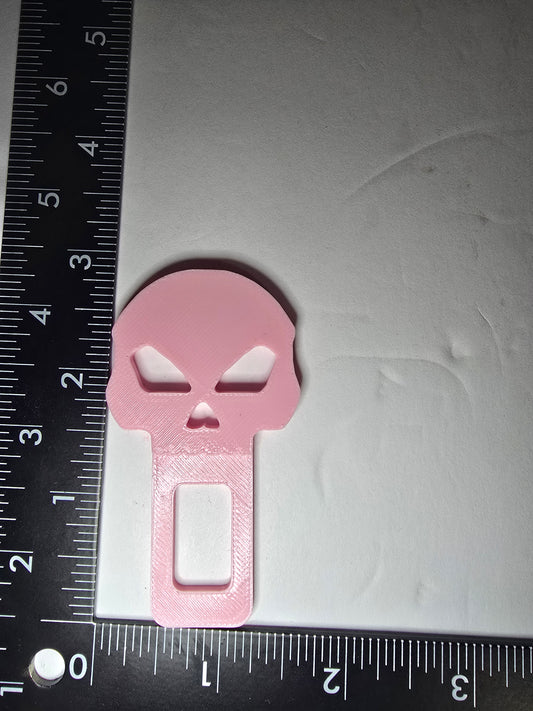 Skull seat belt alarm stopper