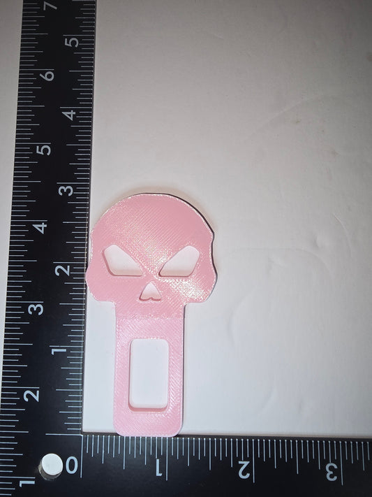 Skull seat belt alarm stopper