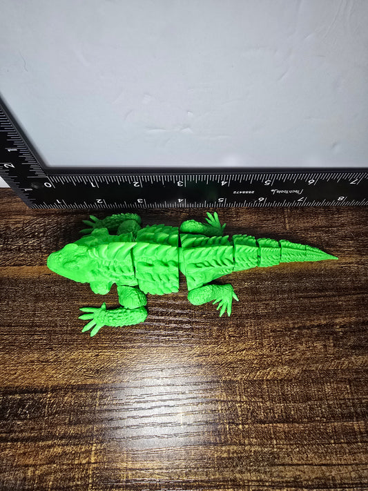 articulated iguana fidget toy